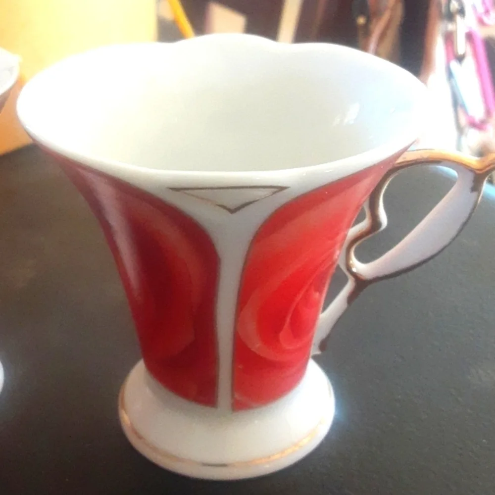 Set of Red and Orange Decorative Cups